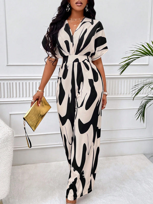 SOLERSUN Allover Print Batwing Sleeve Belted Jumpsuit